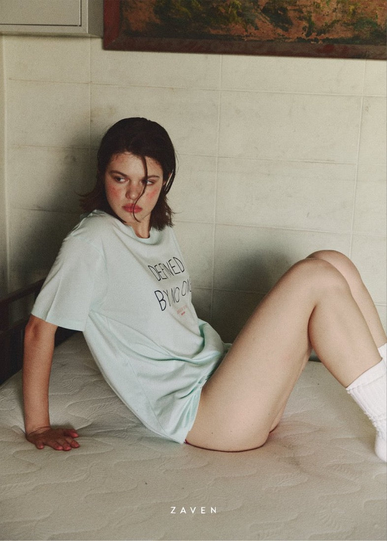 DEFINED BY NO ONE TEE