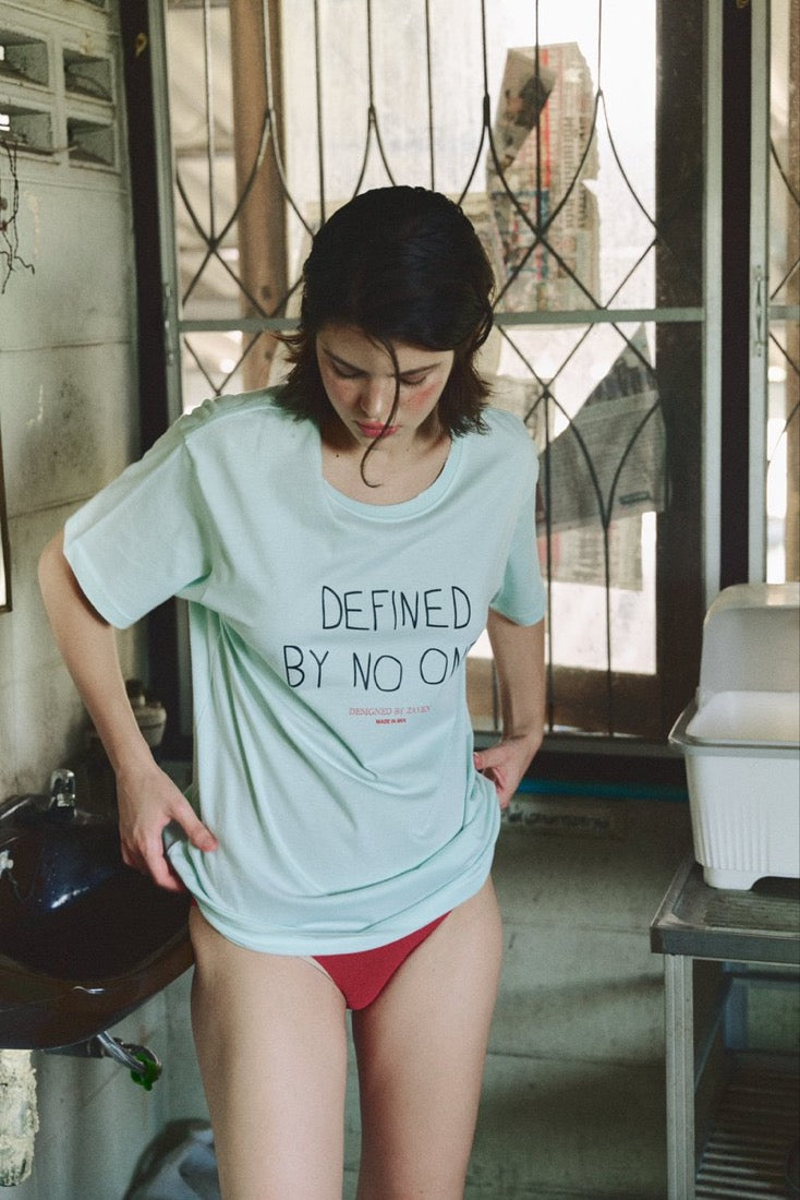 DEFINED BY NO ONE TEE
